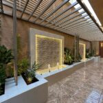 تنسيق حدائق بالدمام والخبر وتركيب العشب الصناعي والشلالات والمظلات والغرف الزجاجية