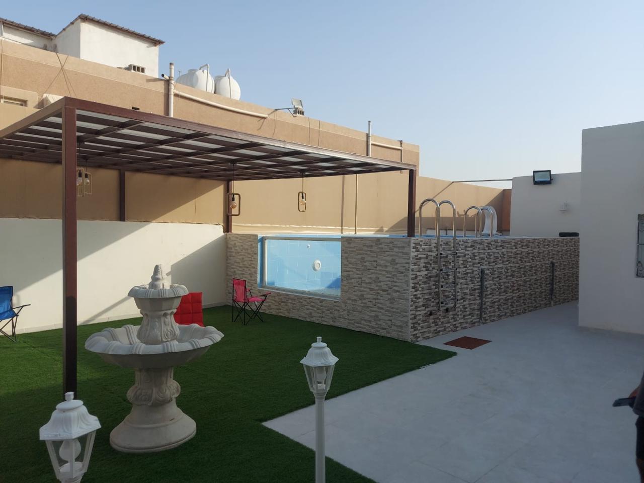 تنسيق حدائق بالدمام والخبر وتركيب العشب الصناعي والشلالات والمظلات والغرف الزجاتجية (285)