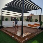 تنسيق حدائق بالدمام والخبر وتركيب العشب الصناعي والشلالات والمظلات والغرف الزجاجية